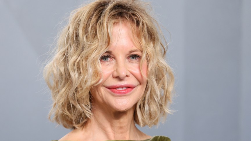 Meg Ryan smiles while attending the 2026 Vanity Fair Oscar Party