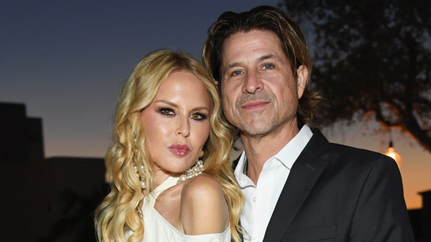 Rachel Zoe and Rodger Berman pose for a photo