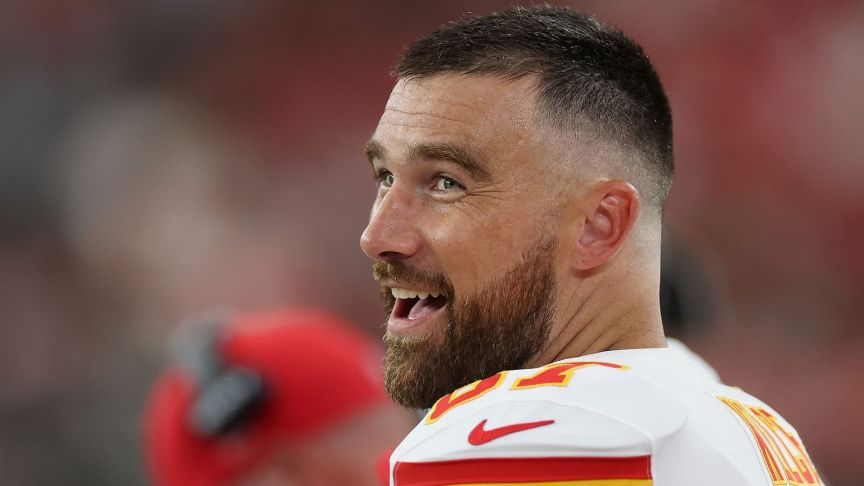 Tight end Travis Kelce #87 of the Kansas City Chiefs reacts on the sidelines during the first quarter of the NFL Preseason 2025 game against the Arizona Cardinals at State Farm Stadium on August 09, 2025 in Glendale, Arizona