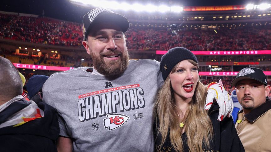 Taylor Swift celebrates with Travis Kelce #87 of the Kansas City Chiefs after defeating the Buffalo Bills 32-29 in the AFC Championship Game at GEHA Field at Arrowhead Stadium on January 26, 2025