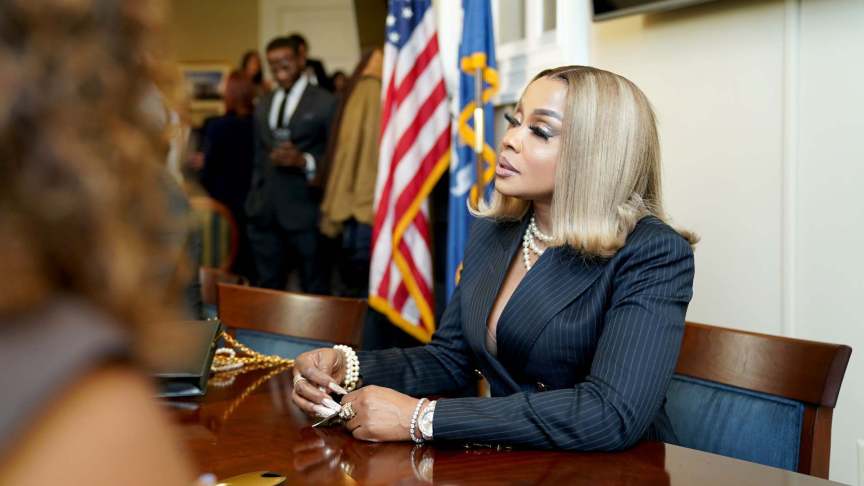 Phaedra Parks, RHOA, The Real Housewives of Atlanta wearing a black suit