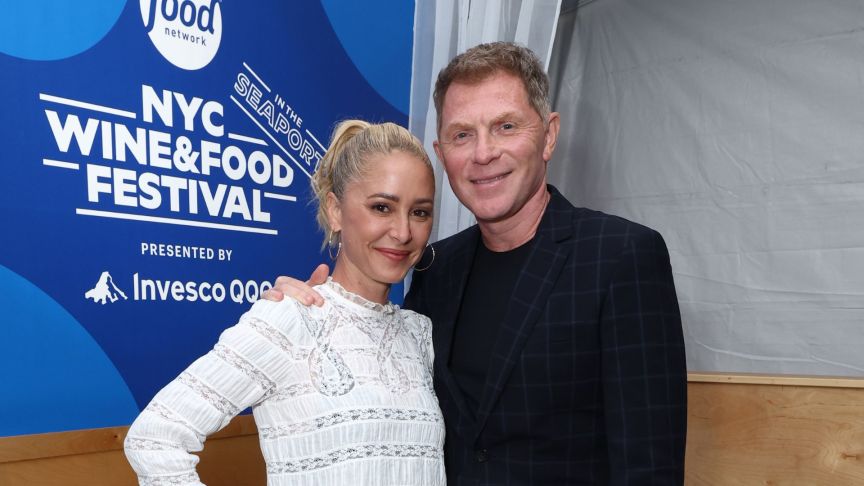 Brooke Williamson and Bobby Flay attend the Grand Tasting: After Dark presented by Montchevre Goat Cheese hosted by Bobby Flay and Brooke Williamson during Food Network New York City Wine & Food Festival presented by Invesco QQQ on October 18, 2025 in New York City