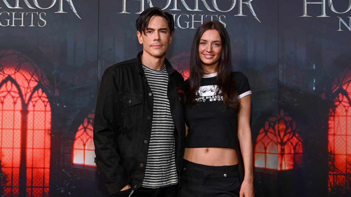 Tom Sandoval and Victoria Lee Robinson attend Halloween Horror Nights opening night