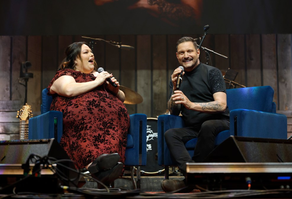 Chrissy Metz and Ty Herndon speaking onstage