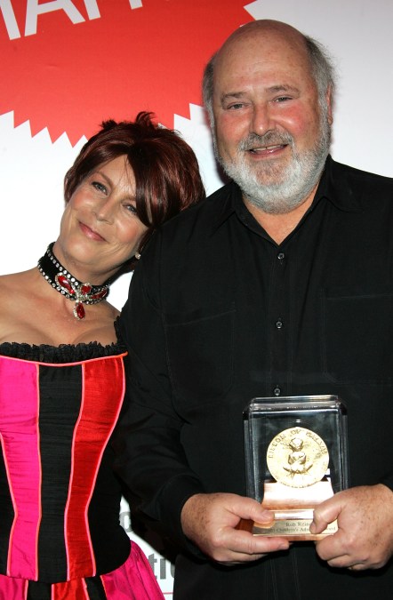 Actress Jamie Lee Curtis presents director Rob Reiner with an award at the 12th Annual Dream Halloween Fundraiser to raise money for Children Affected by AIDS Foundation held at Santa Monica Airport, on October 29, 2005