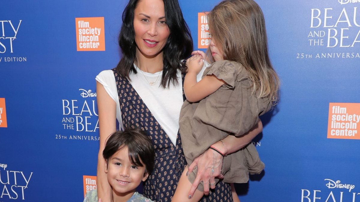 Jules Wainstein poses with her children Rio and Jagger at a New York City screening