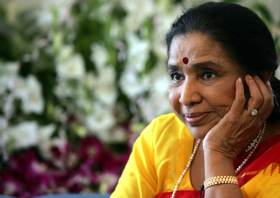 Legendary Bollywood film music singer, Asha Bhosle poses on her 74th birthday