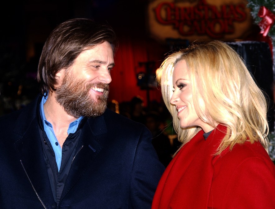 Jim Carrey (L) with his companion Jenny McCarthy.