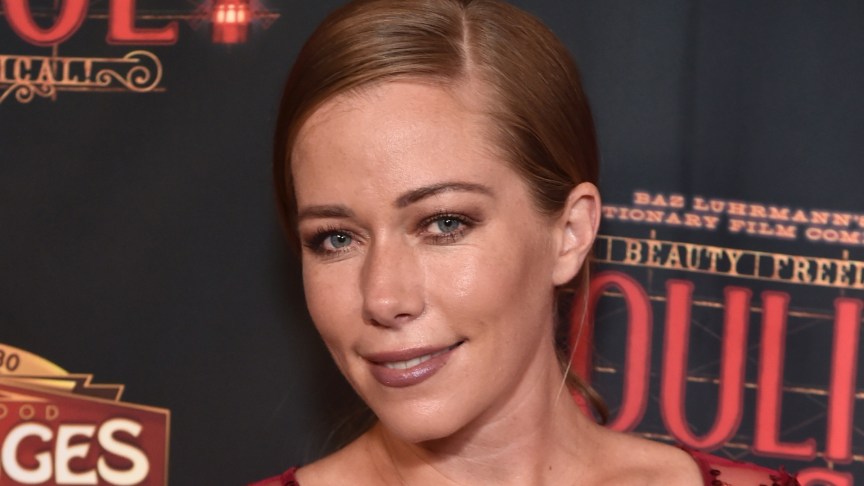 Kendra Wilkinson poses for photos at an event