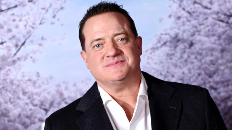 Brendan Fraser poses for photos at an event