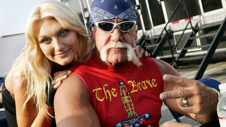 Brooke Hogan and Hulk Hogan pose for a photo