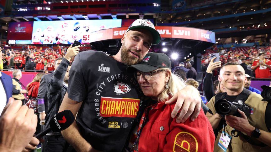Travis Kelce #87 of the Kansas City Chiefs celebrates with Donna Kelce after defeating the Philadelphia Eagles 38-35 in Super Bowl LVII at State Farm Stadium on February 12, 2023 in Glendale, Arizona