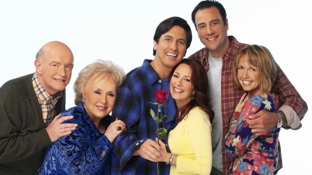 Cast of “Everybody Loves Raymond” posing together in promotional photo.