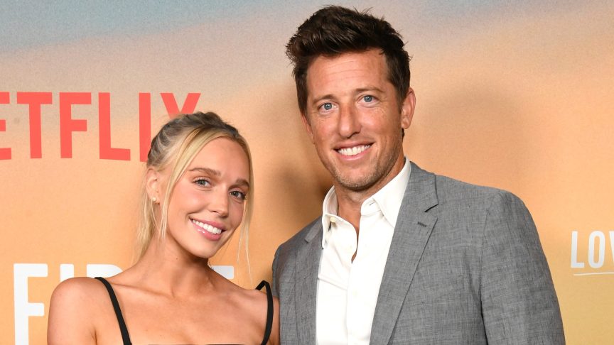 Alex Cooper and husband Matt Kaplan pose together at Netflix’s “Love at First Sight” screening in Los Angeles.