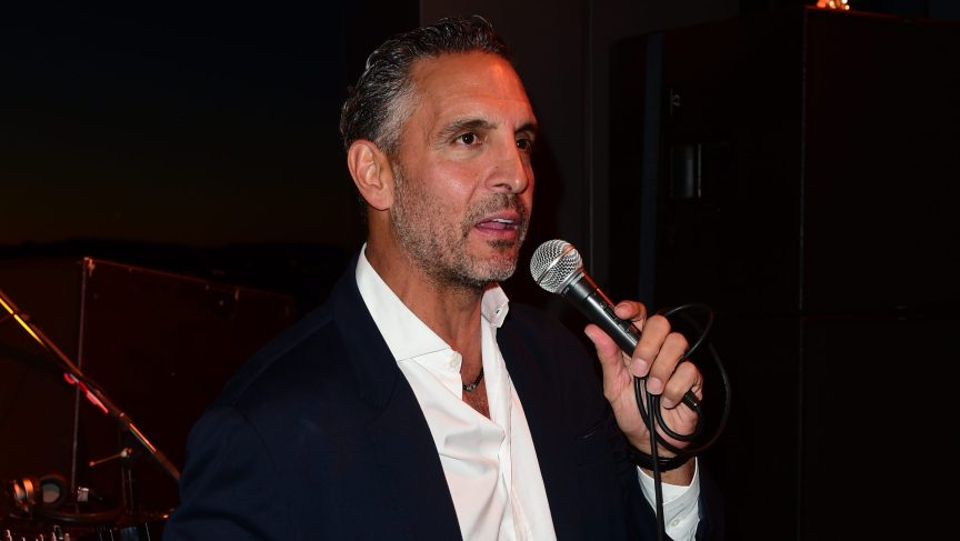 Mauricio Umansky speaking into a microphone at an event in Los Angeles
