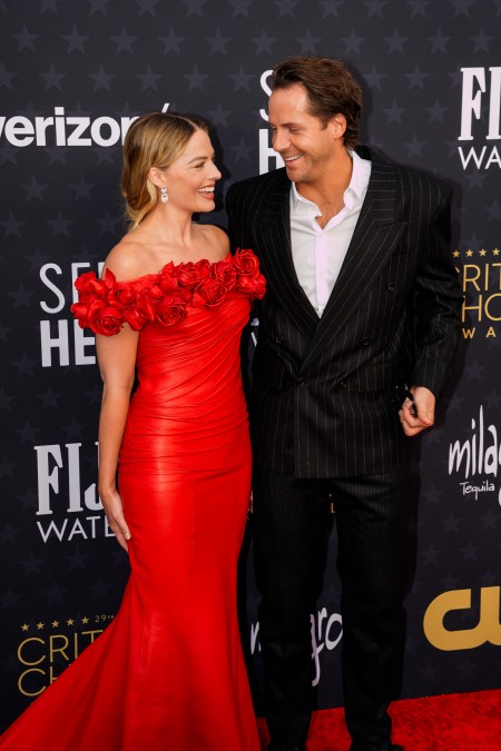 Margot Robbie and Tom Ackerley at the Critics Choice Awards in 2024.