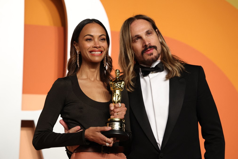 US actress Zoe Saldana (L) poses next to husband Italian film producer Marco Perego-Saldana