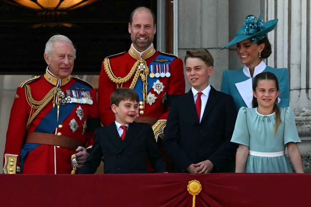 King Charles and Princess Kate with their family.