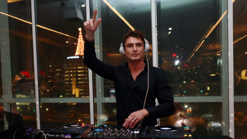 James Kennedy DJs at the Pups Without Borders holiday party in Hollywood, California.