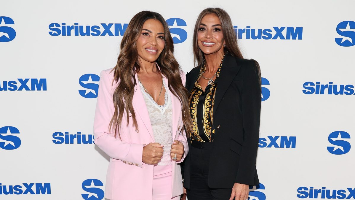 Dolores Catania and Liz McGraw posing together at SiriusXM Studios in New York City