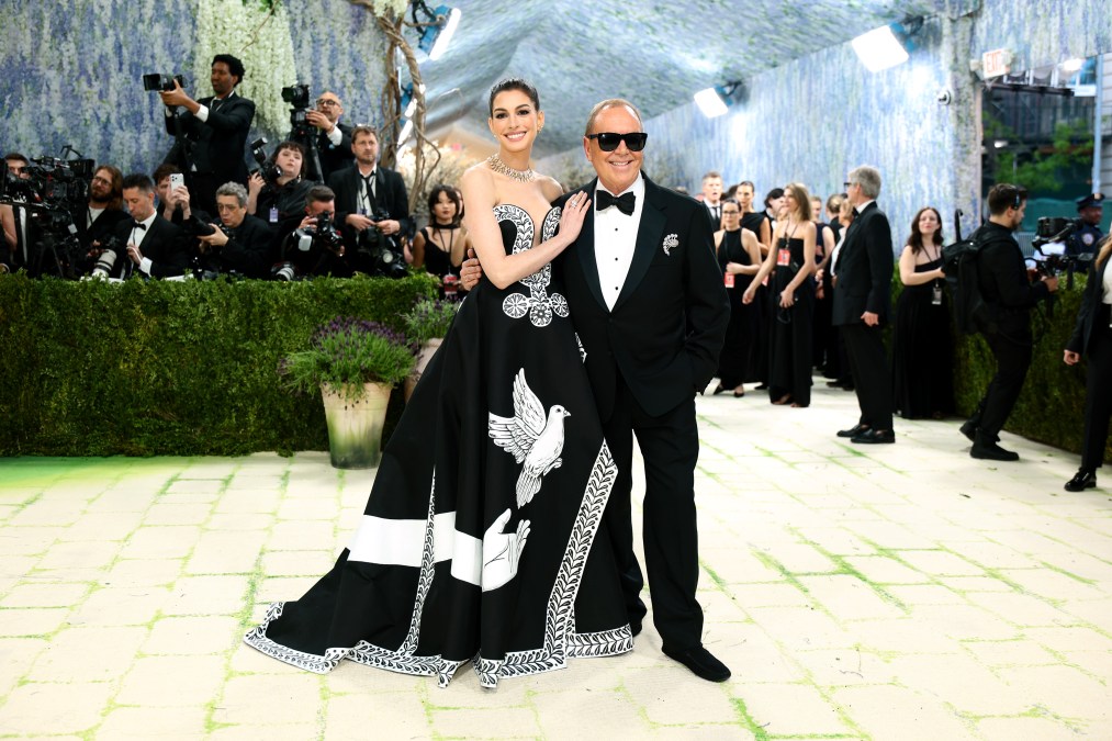 Anne Hathaway and Michael Kors at the 2026 Met Gala.