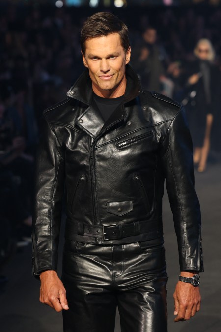 US former football player Tom Brady walks the runway during the Gucci Cruise 2027 collection