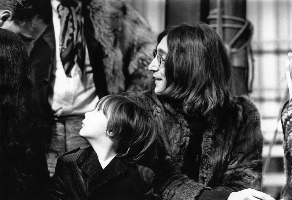 Julian Lennon and John Lennon in 1968.