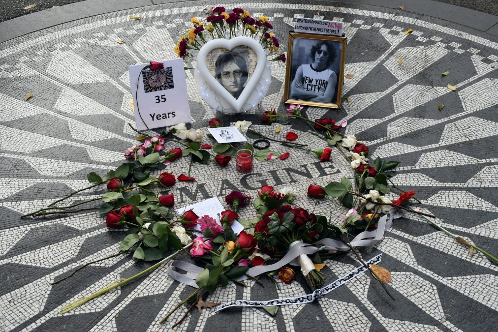 Items left on the mosaic named for the John Lennon's song "Imagine" December 8, 2015 at Strawberry Fields, the Central Park garden dedicated in his honor, in New York. 