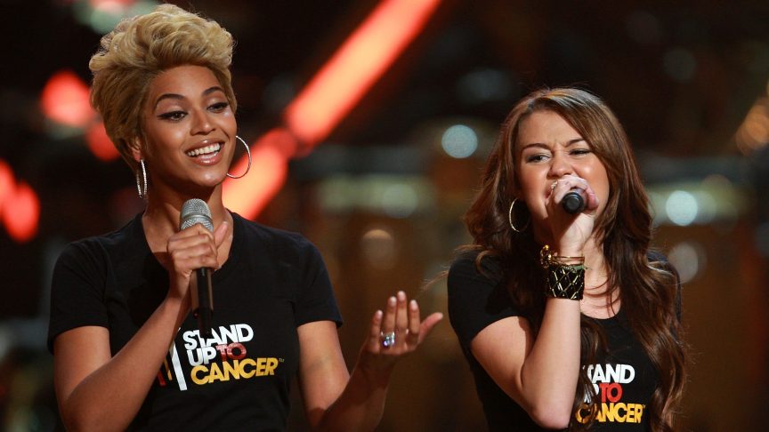 Beyoncé and Miley Cyrus perform together on stage at Fashion Rocks in New York City in 2008.