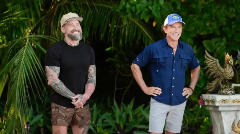 Jeff Probst stands beside Zac Brown during a reward challenge on “Survivor 50”