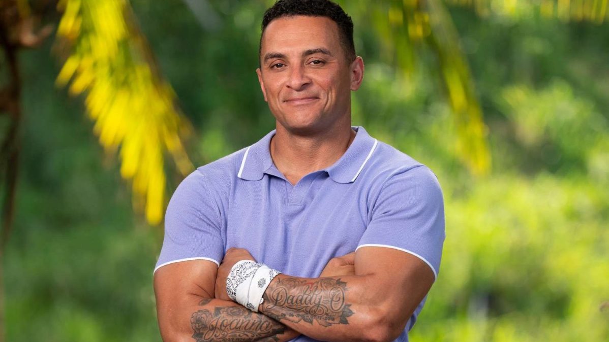 Joe Hunter poses for an official “Survivor 50” promotional photo.