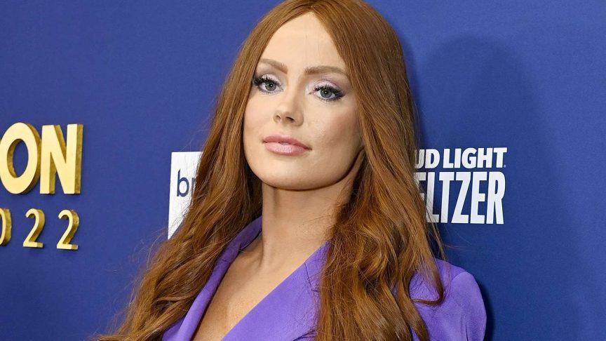 “Southern Charm” alum Kathryn Dennis poses at a Bravo event in a purple blazer