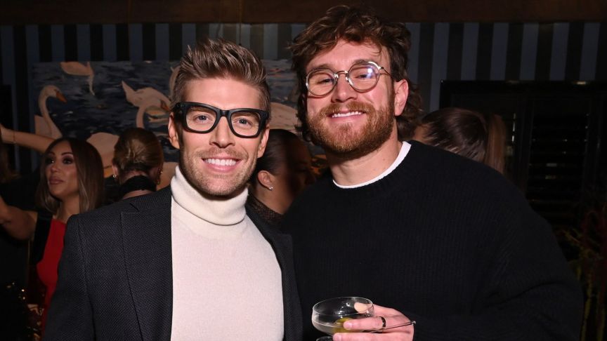 Kyle Cooke and West Wilson attend Threads Reality TV Holiday Dinner co-hosted by Amanda Hirsch (@notskinnybutnotfat) and VP of Threads Product, Emily Dalton Smith in NYC at The Golden Swan on December 10, 2025