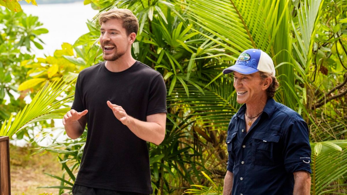 MrBeast speaking beside Jeff Probst during a Survivor 50 challenge segment