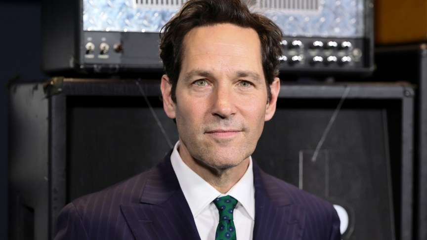 Paul Rudd poses for photos at an event