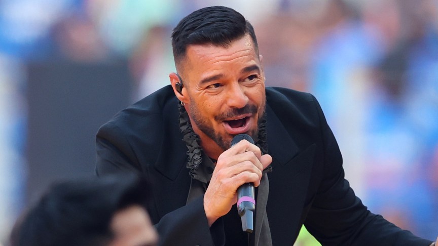 Ricky Martin performing onstage with microphone