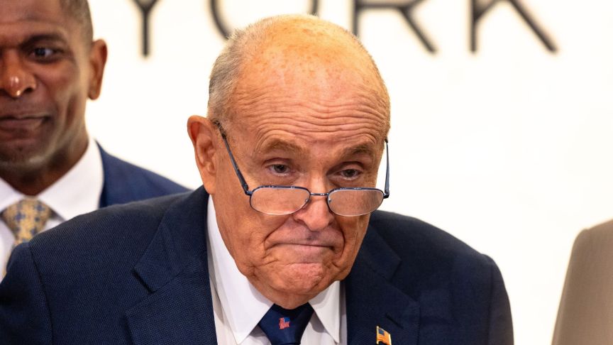 Former New York City Mayor Rudy Giuliani accompanies Chris Ruddy, CEO of Newsmax, for the ringing the opening bell at the New York Stock Exchange during morning trading on April 03, 2025