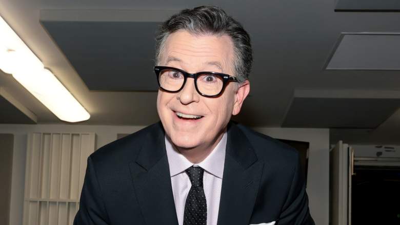 Stephen Colbert smiling and attending an event