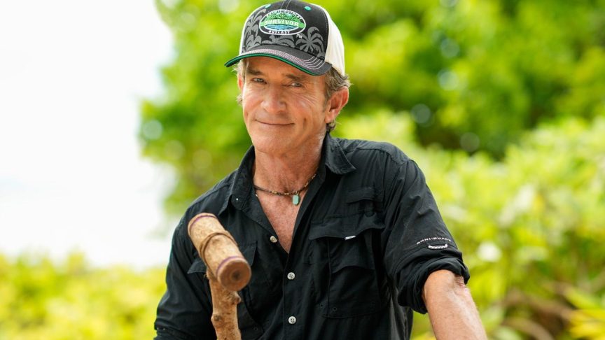 Jeff Probst holding a torch snuffer during Survivor filming in Fiji