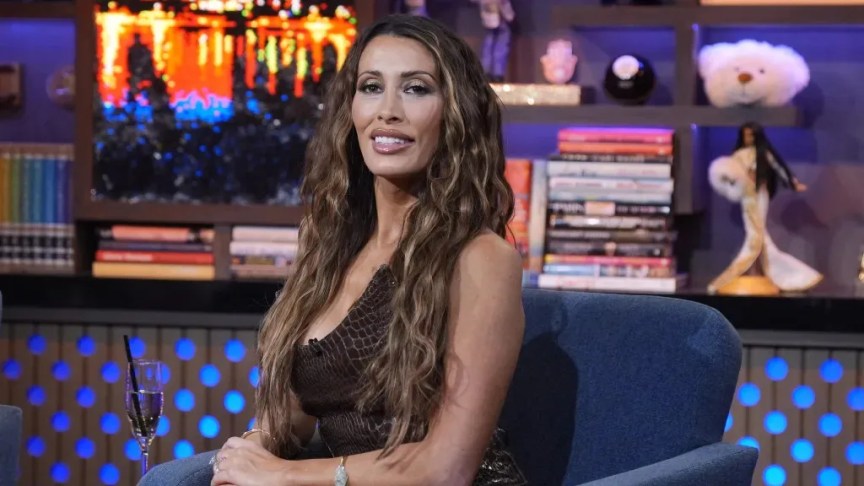 Alicia Carmody smiles while appearing on the "Watch What Happens Live with Andy Cohen" set.