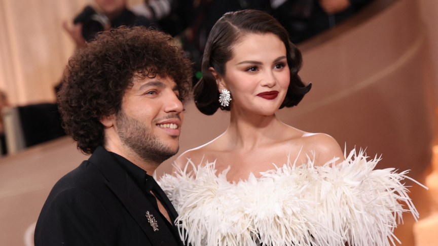 Benny Blanco and Selena Gomez pose for photos at an event