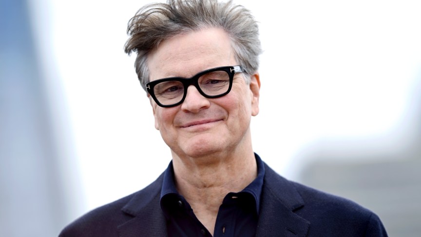 Colin Firth poses for photos at "Disclosure Day" premiere