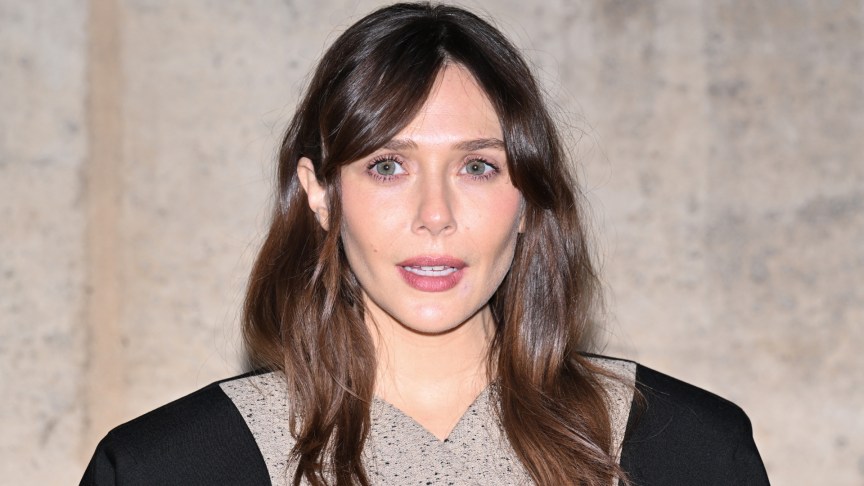 Elizabeth Olsen poses for photos at an event