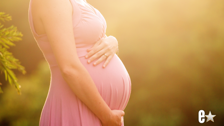 Woman with a pregnant stomach
