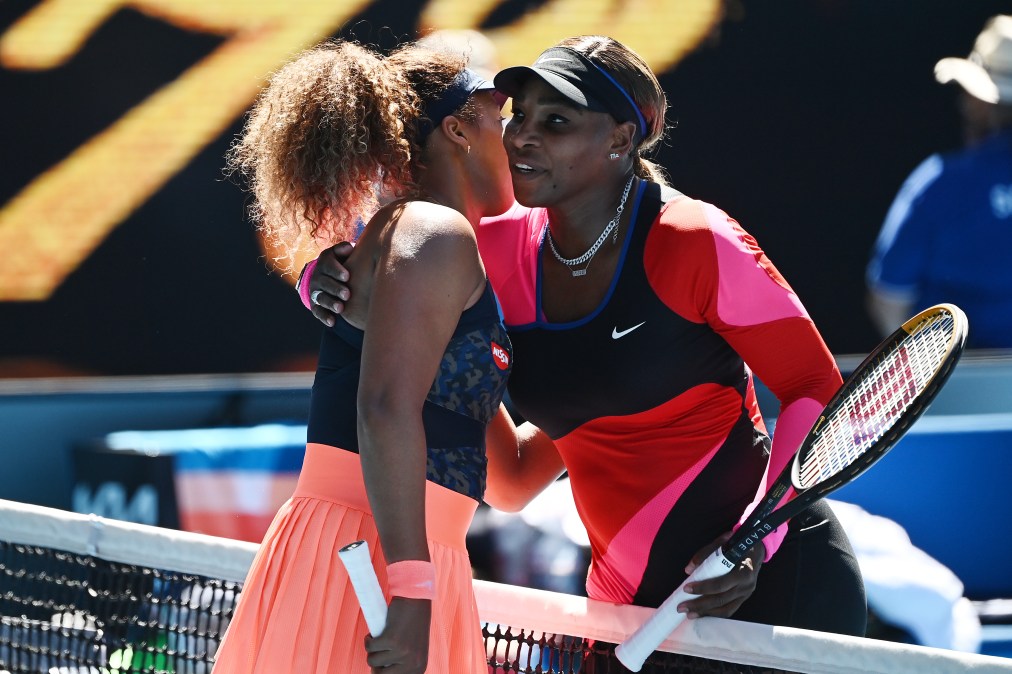 Serena Williams of the United States (R) embraces Naomi Osaka of Japan following her defeat in their Women’s Singles Semifinals match during day 11 of the 2021 Australian Open at Melbourne Park on February 18, 2021 in Melbourne, Australia.