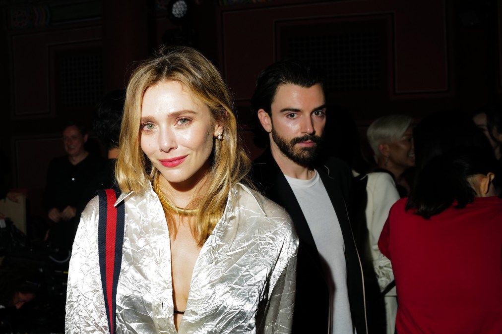Elizabeth Olsen and husband Robbie Arnett attend the Gucci Seoul Cruise 2024 fashion show in May 2023