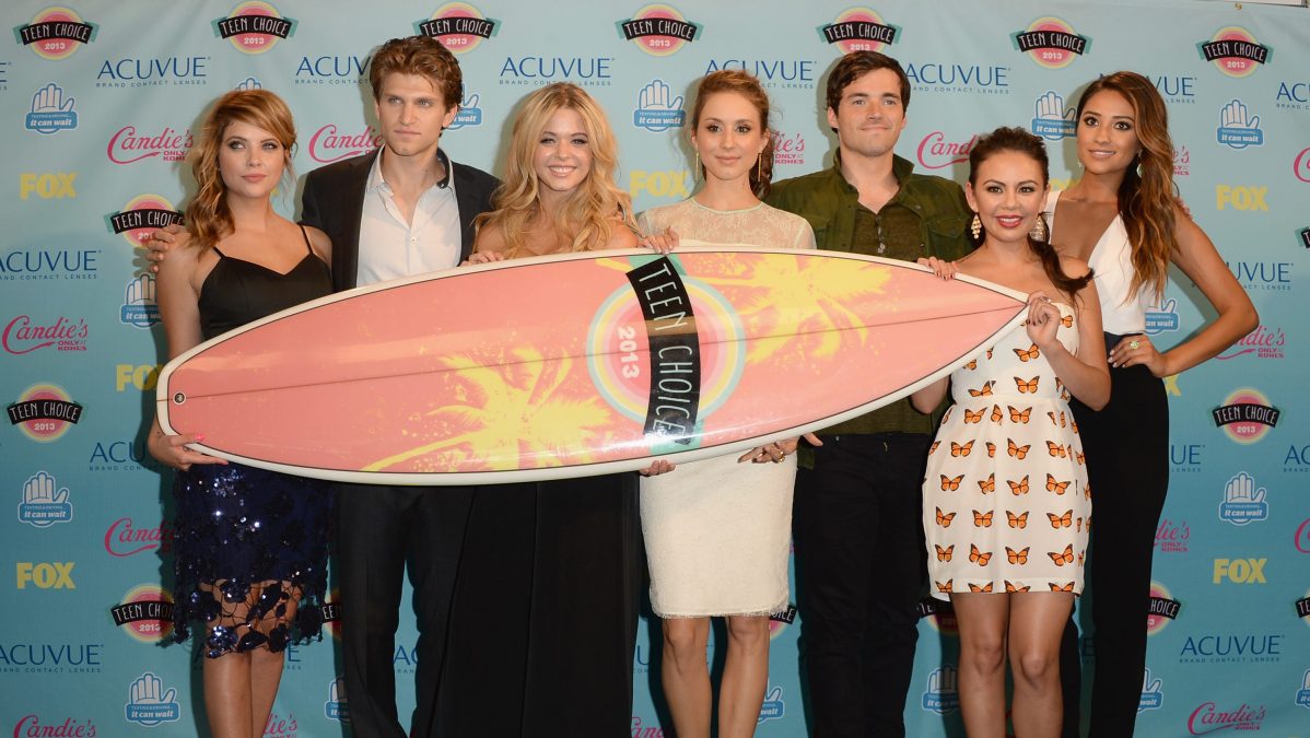 Ashley Benson, Keegan Allen, Sasha Pieterse, Troian Bellisario, Ian Harding, Janel Parrish and Shay Mitchell, winner of Choice TV Show: Drama for "Pretty Little Liars," attend the Teen Choice Awards 2013.