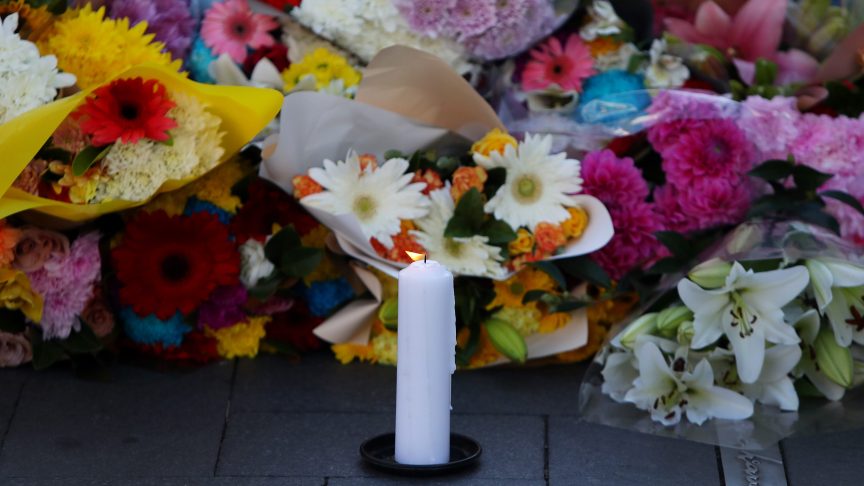 Flowers and a candle for Anne Schedeen.