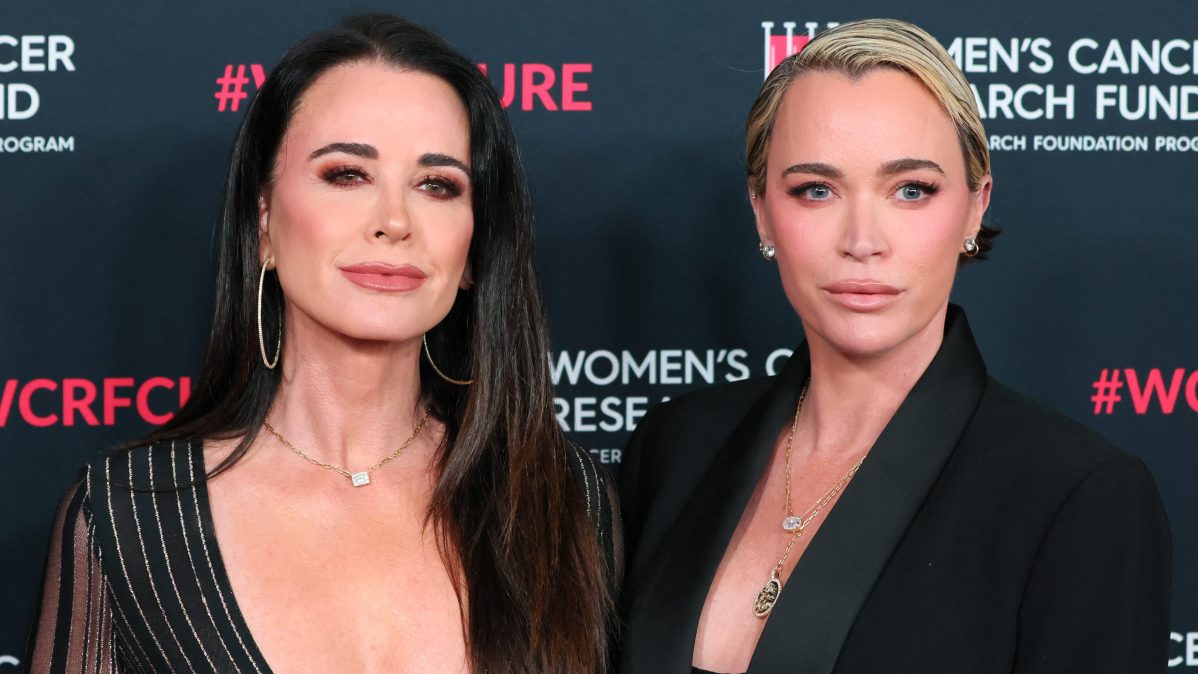 Kyle Richards and Teddi Mellencamp pose together on the red carpet at a Women's Cancer Research Fund gala in Beverly Hills.