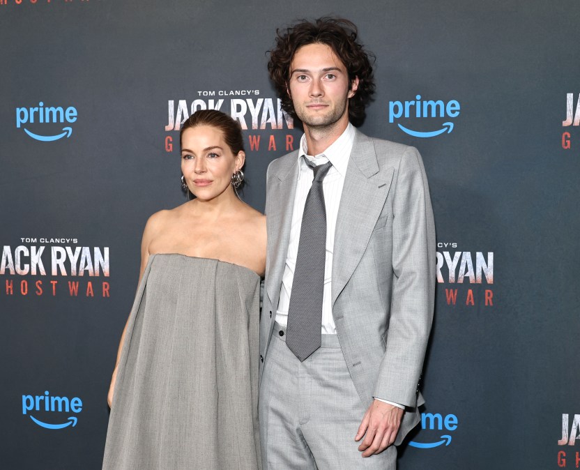 Sienna Miller and Oli Green attend Amazon MGM's "Tom Clancy's Jack Ryan: Ghost War" World Premiere at Regal Times Square on May 15, 2026 in New York City. (Photo by Jamie McCarthy/Getty Images)